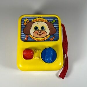 Shelcore Windup Yellow Musical Radio Puppy Moving Eyes 1990